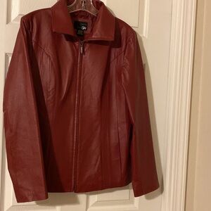 Leather jacket size M. Red. Zip closure. High neck.